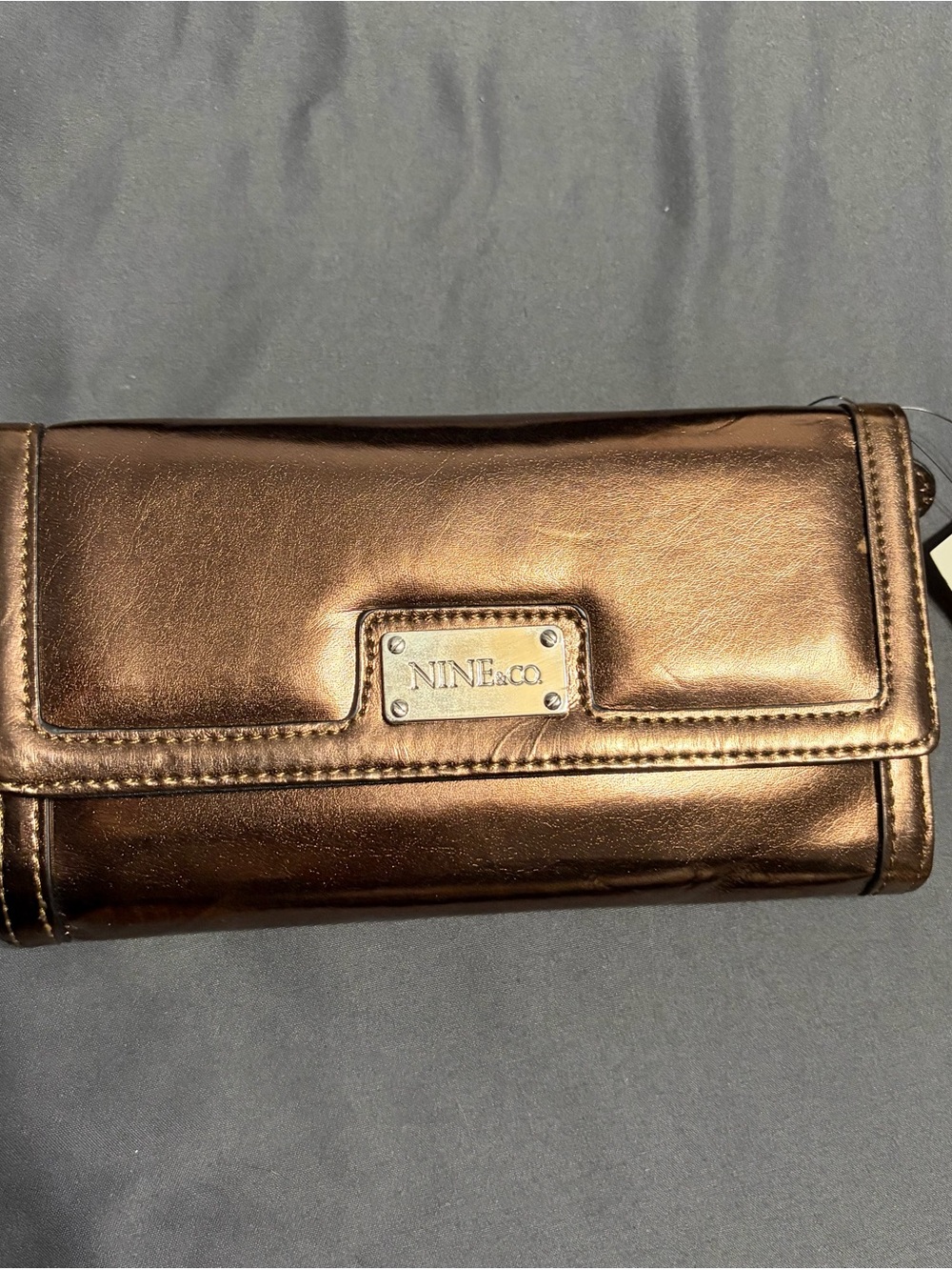 Nine & Co. Metallic Bronze Foldover Wallet